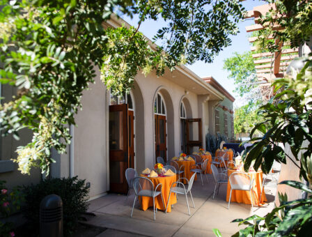A sunny afternoon on the Key Room patio, with tables carefully set and ready.