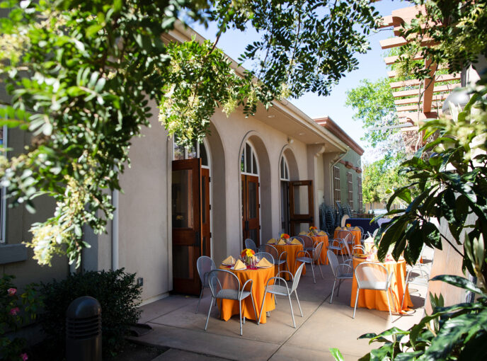A sunny afternoon on the Key Room patio, with tables carefully set and ready.