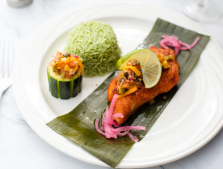 A fish dinner served on a plate.