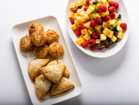 Breakfast dishes displayed on platters.