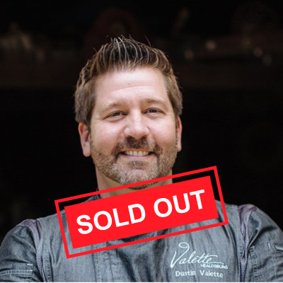 Chef with dark hair and gray chef's jacket with words 'Sold Out' superimposed in red