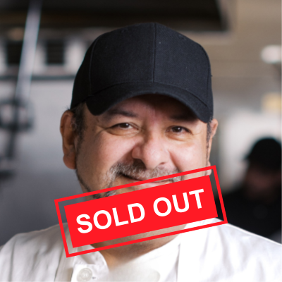 Chef in white coat with word "sold out" in red