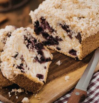 Sliced crumb cake on a board