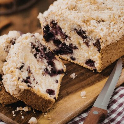Sliced crumb cake on a board