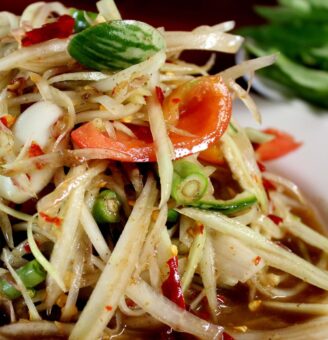 Asian salad with shreds of green papaya and mint