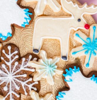 Assortment of holiday cookies with icing includes snowflakes and reindeer
