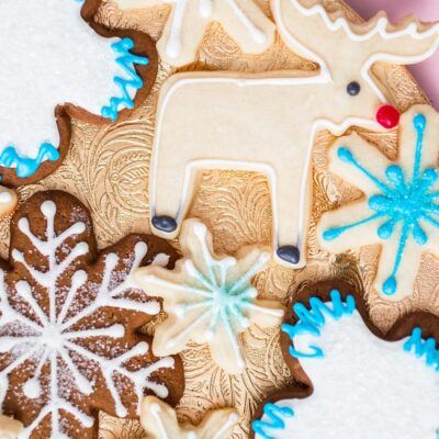 Assortment of holiday cookies with icing includes snowflakes and reindeer